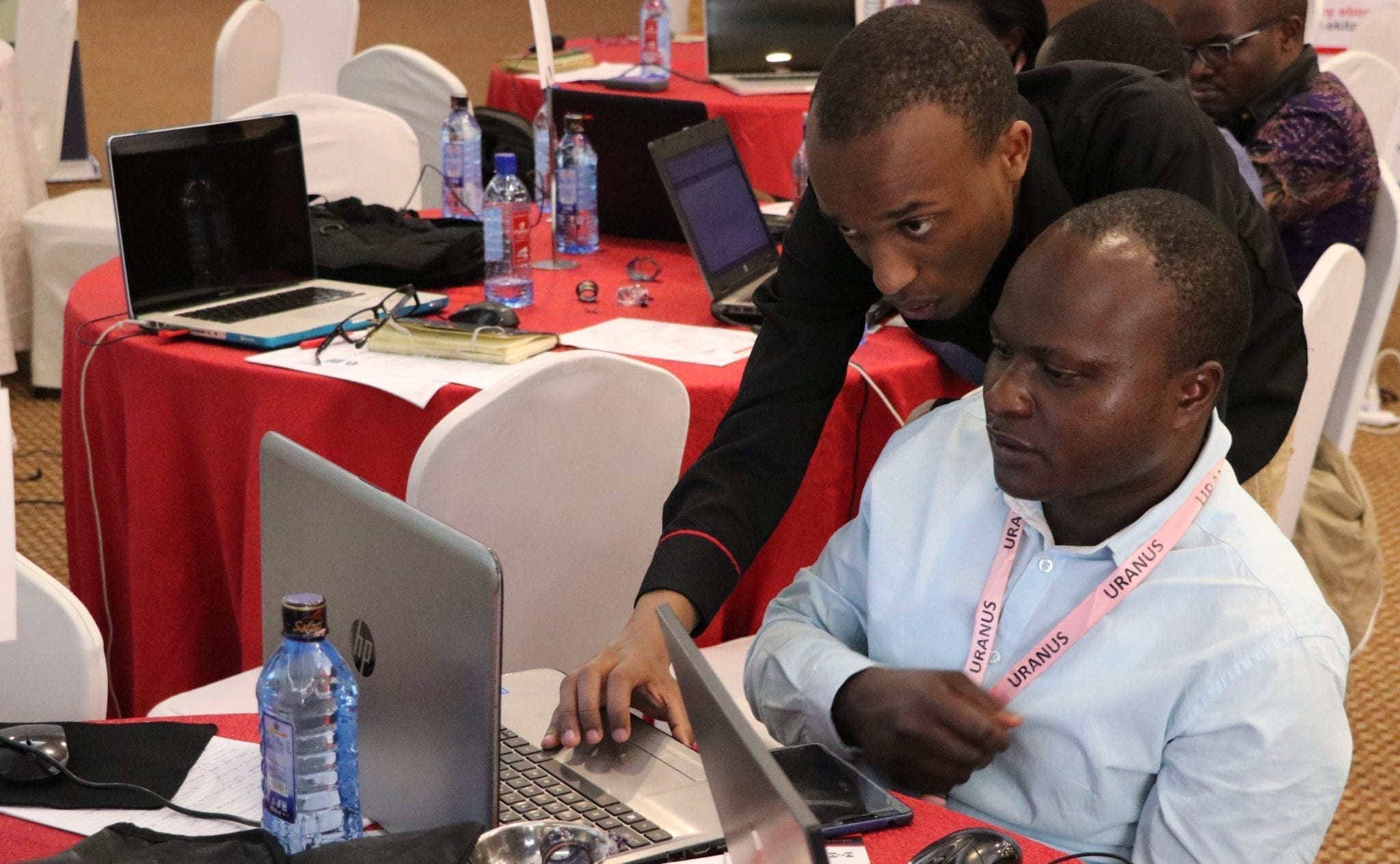 Two men in Kenya participate in a content development challenge for accessible publishing run by Book Boost: Access for All Challenge winner eKitabu.